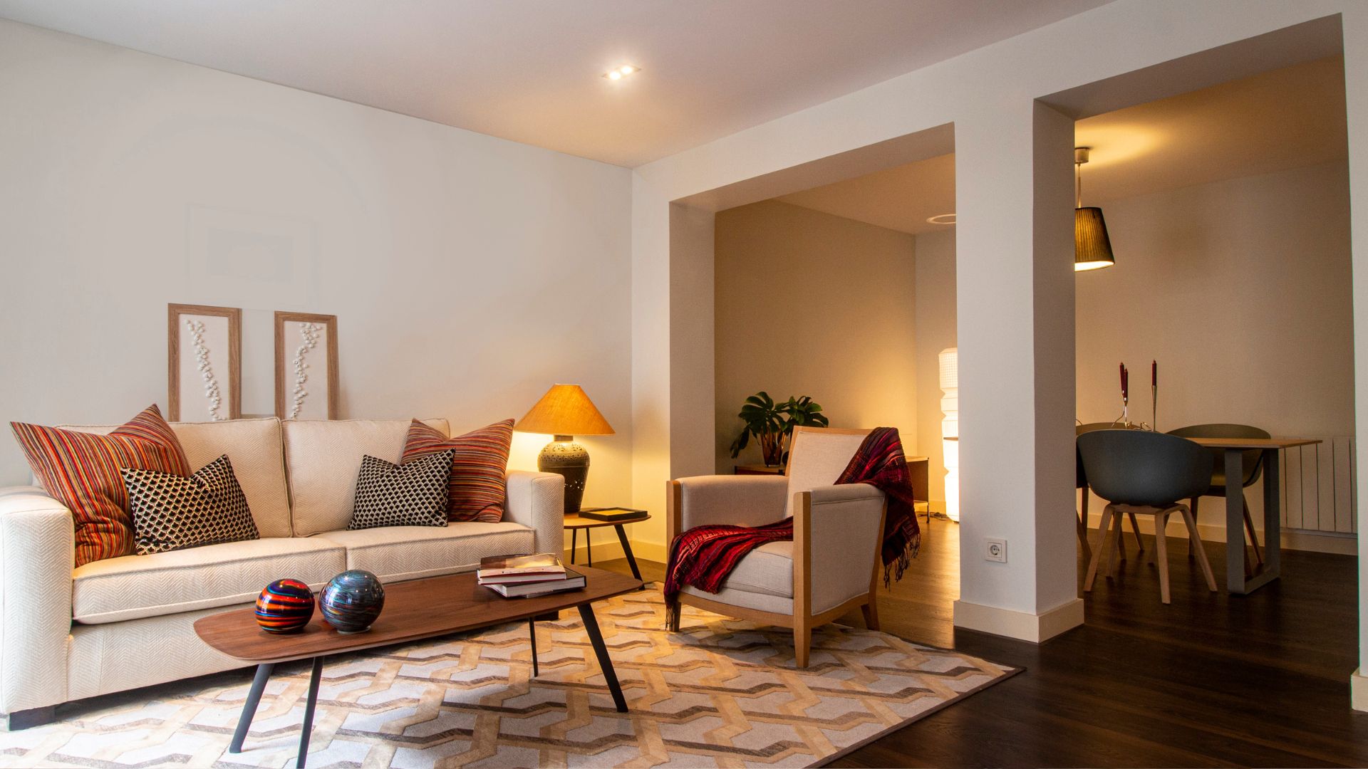 A living room filled with furniture and a table