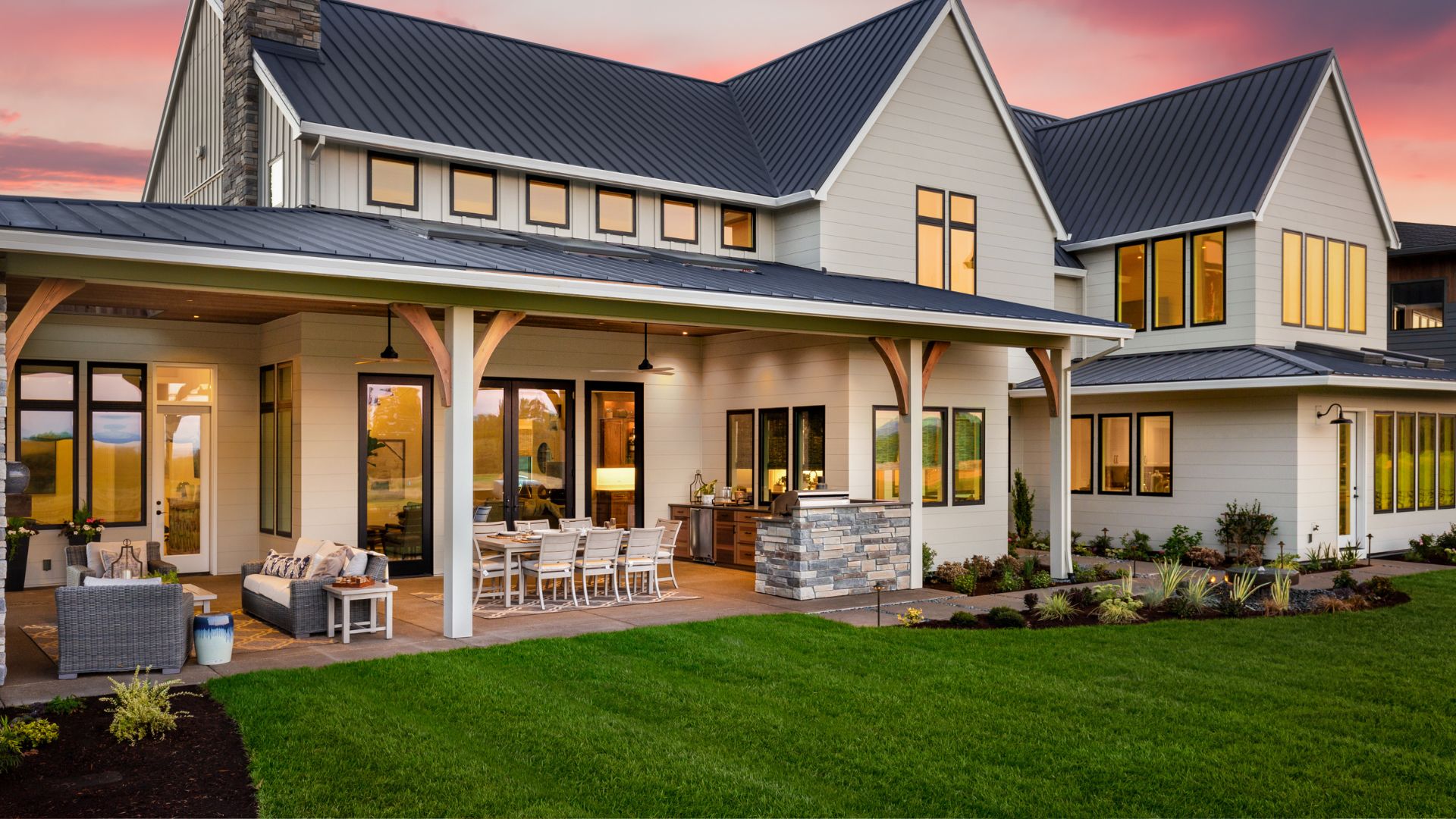 A large white house with a covered patio